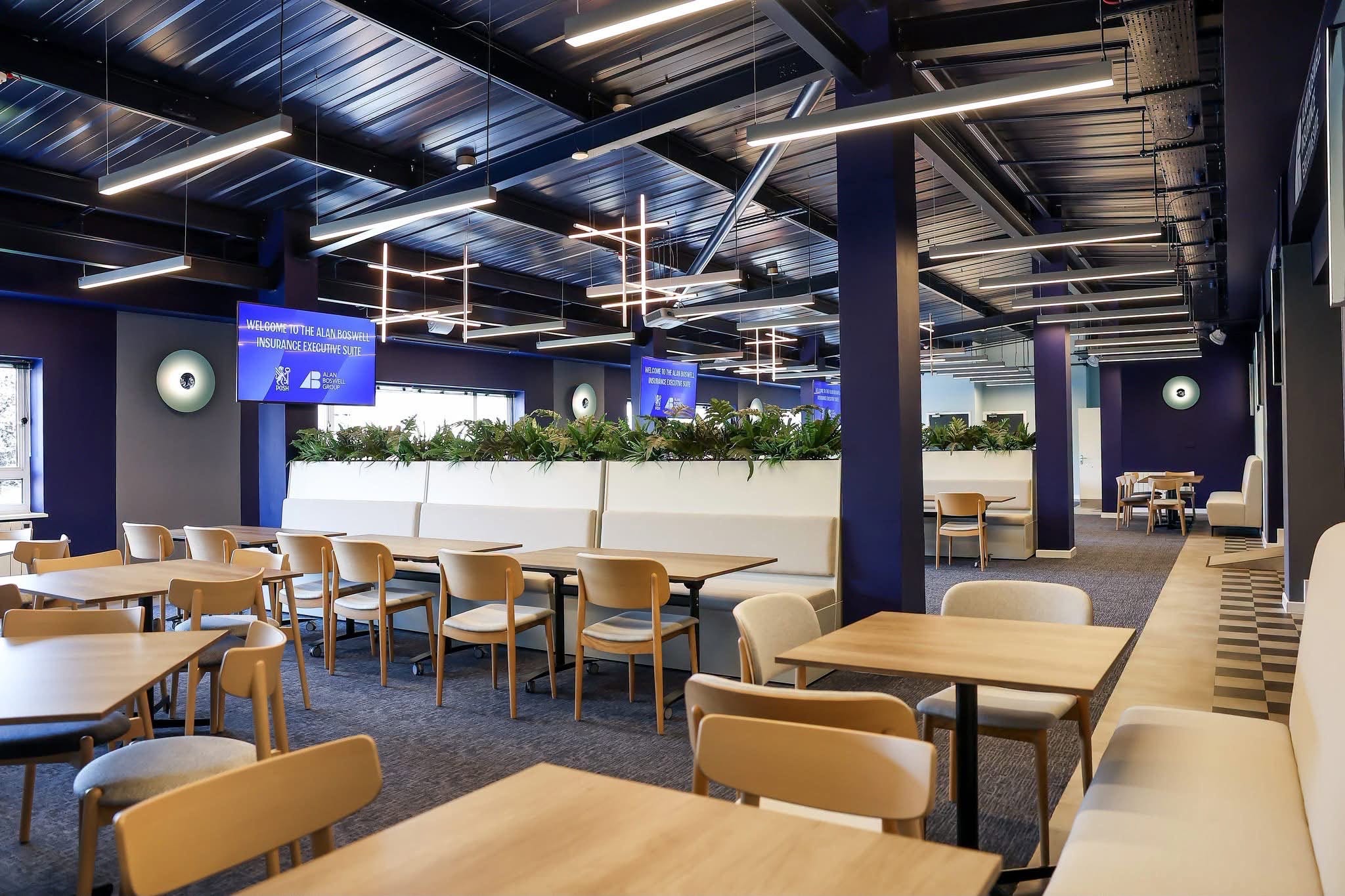 Permanent AV screens and installed lighting in a hospitality venue